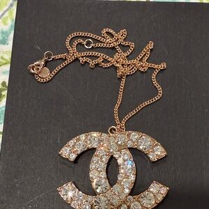 CHANEL Gold Crystal Logo Necklace